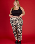 Juliet wearing the Cow Work Pant with the Black Cropped Tank