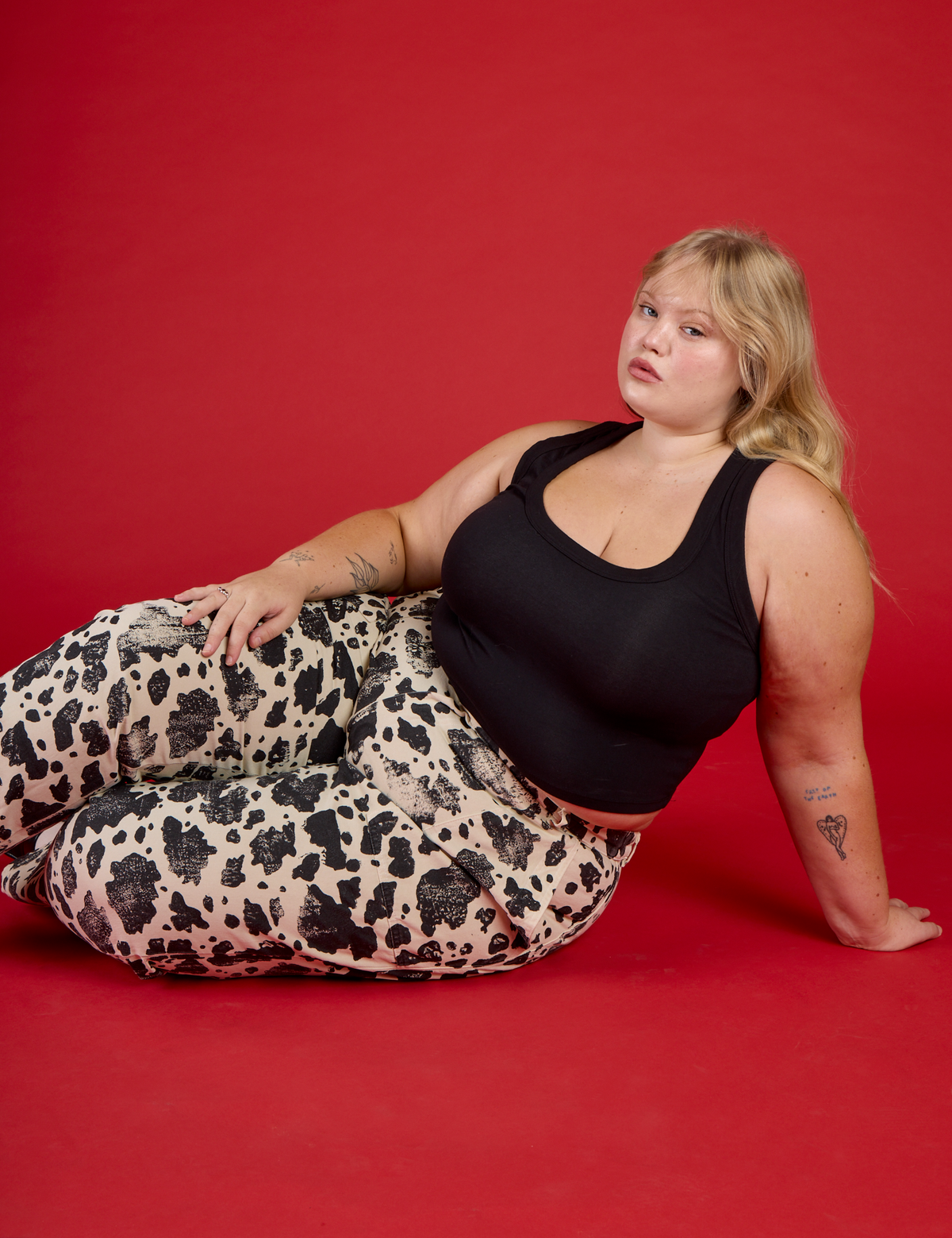 Juliet wearing the Cow Work Pant with the Black Cropped Tank
