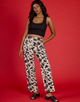 Kandia is 5'3" wearing the Cow Work Pant with the Black Cropped Tank