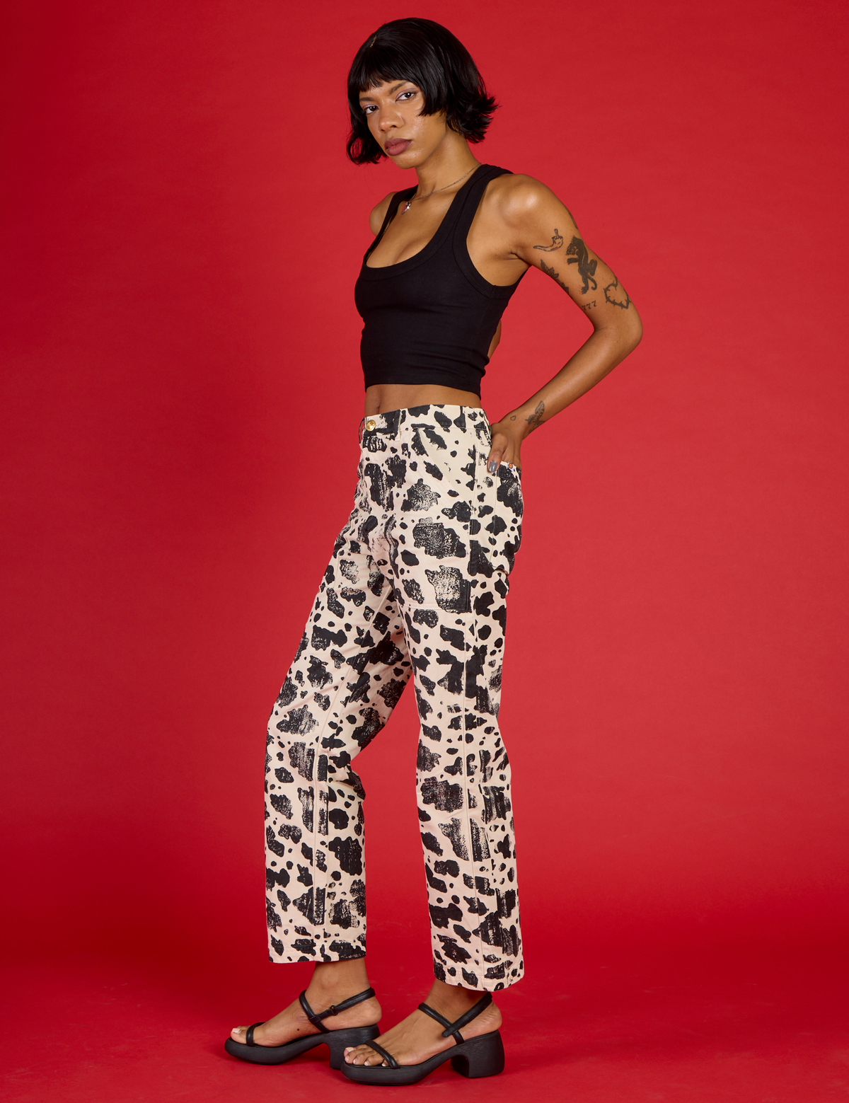 Angled side view of the Cow Work Pant on Kira