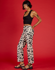 Angled side view of the Cow Work Pant on Kira