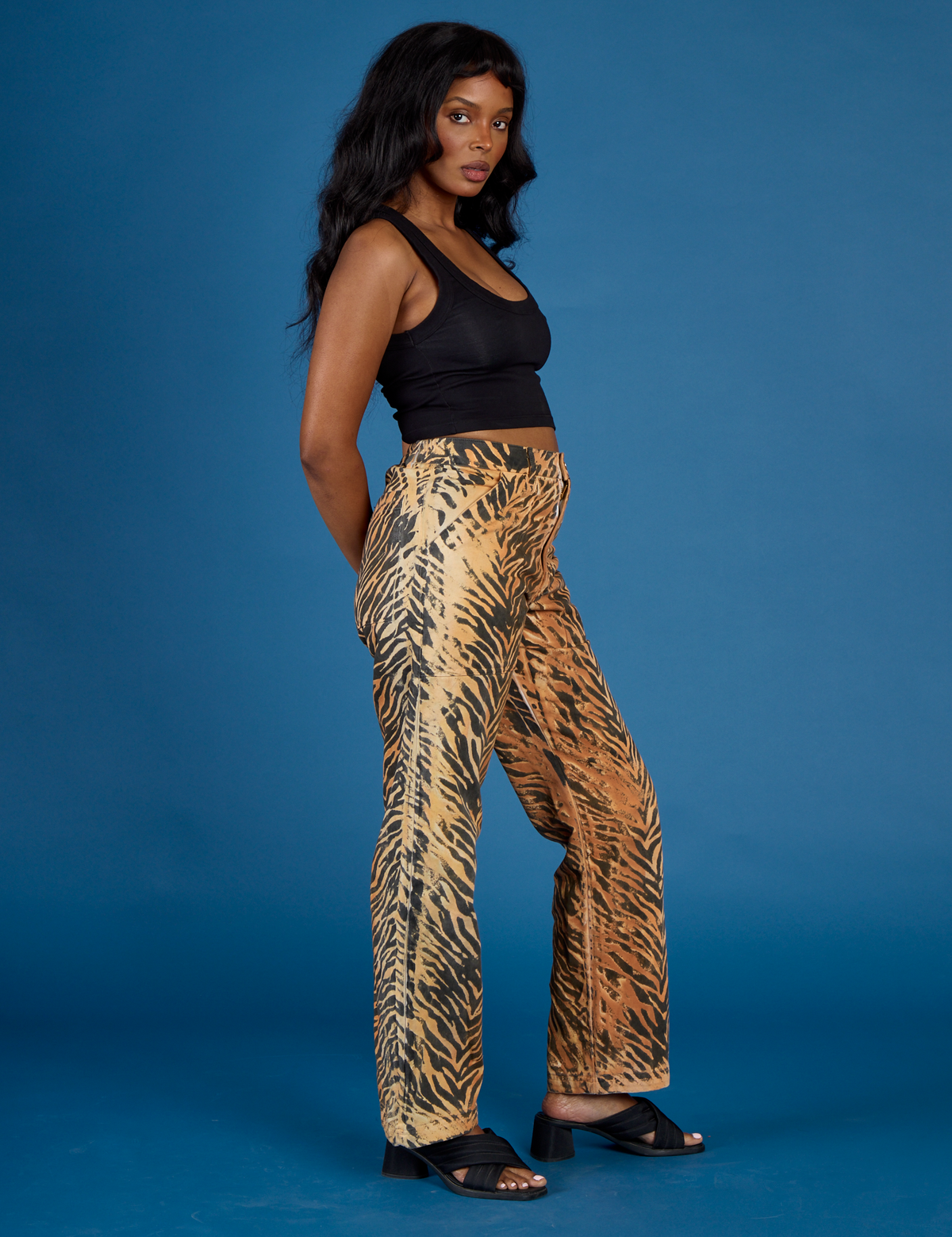 Side view of Kandia wearing  the Tiger Work Pant