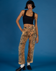 Kira is 5'10" and wearing XS Tiger Work Pant with the Black Cropped Tank