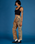 Kira wearing the Tiger Work Pant with the Black Cropped Tank