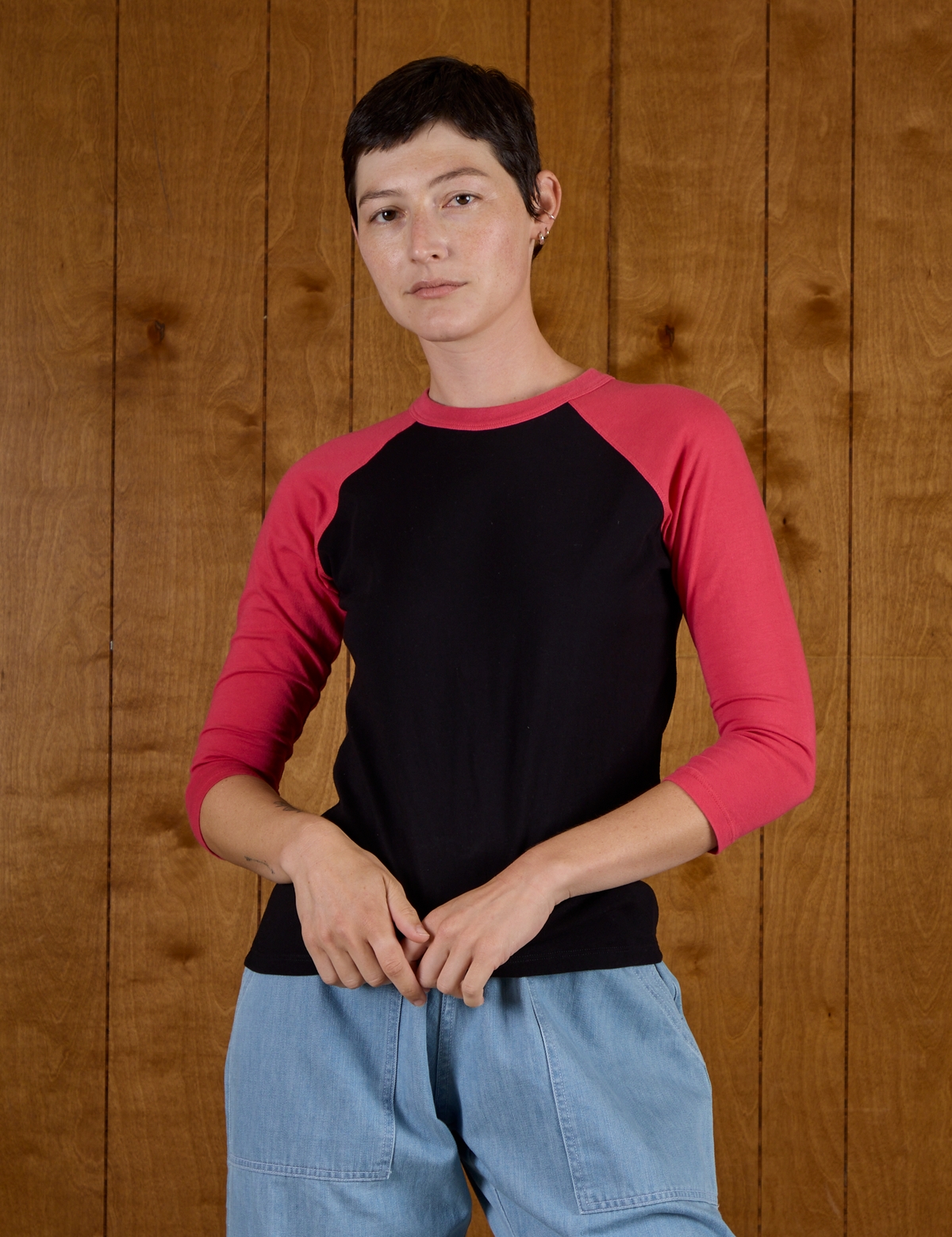 Alex in the Black/Pink Colorblock Raglan Tee