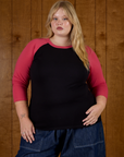 Juliet wearing the Black/Pink Colorblock Raglan Tee