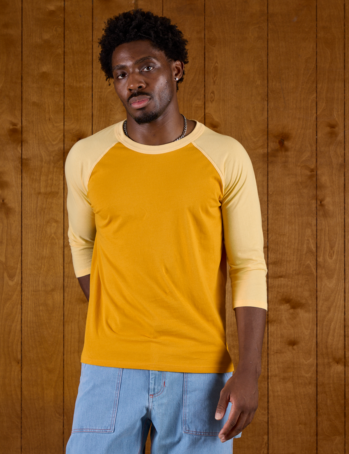 Isaac in the Mustard Yellow/Butter Raglan Tee