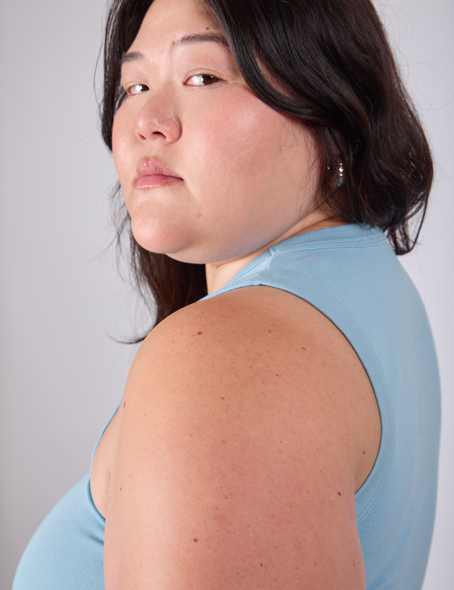 Cropped Tank Top in Baby Blue shoulder close up on Ashley
