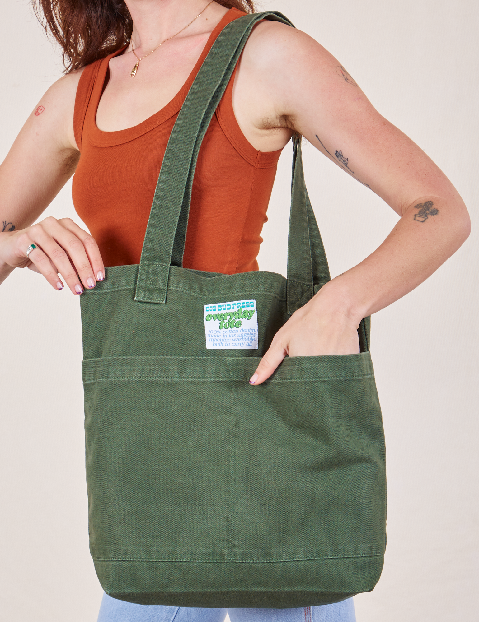 Everyday Tote Bag in Dark Emerald Green worn by model