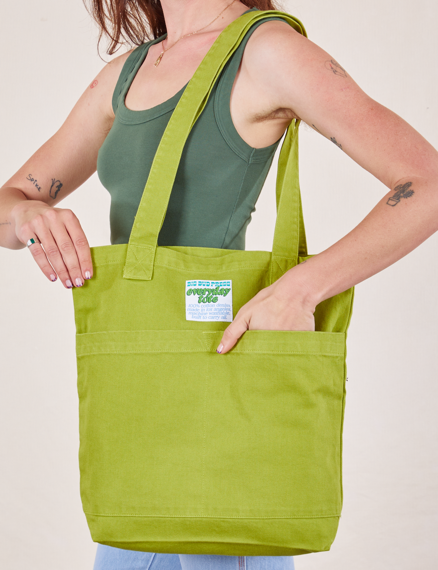 Everyday Tote Bag in Gross Green worn by model