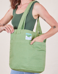 Everyday Tote Bag in Sage Green worn by model