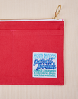 Close up of Pencil Pouch in Hot Pink. Blue and White Big Bud pencil pouch label.