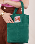 Mini Tote Bag in Hunter Green on Hana's arm
