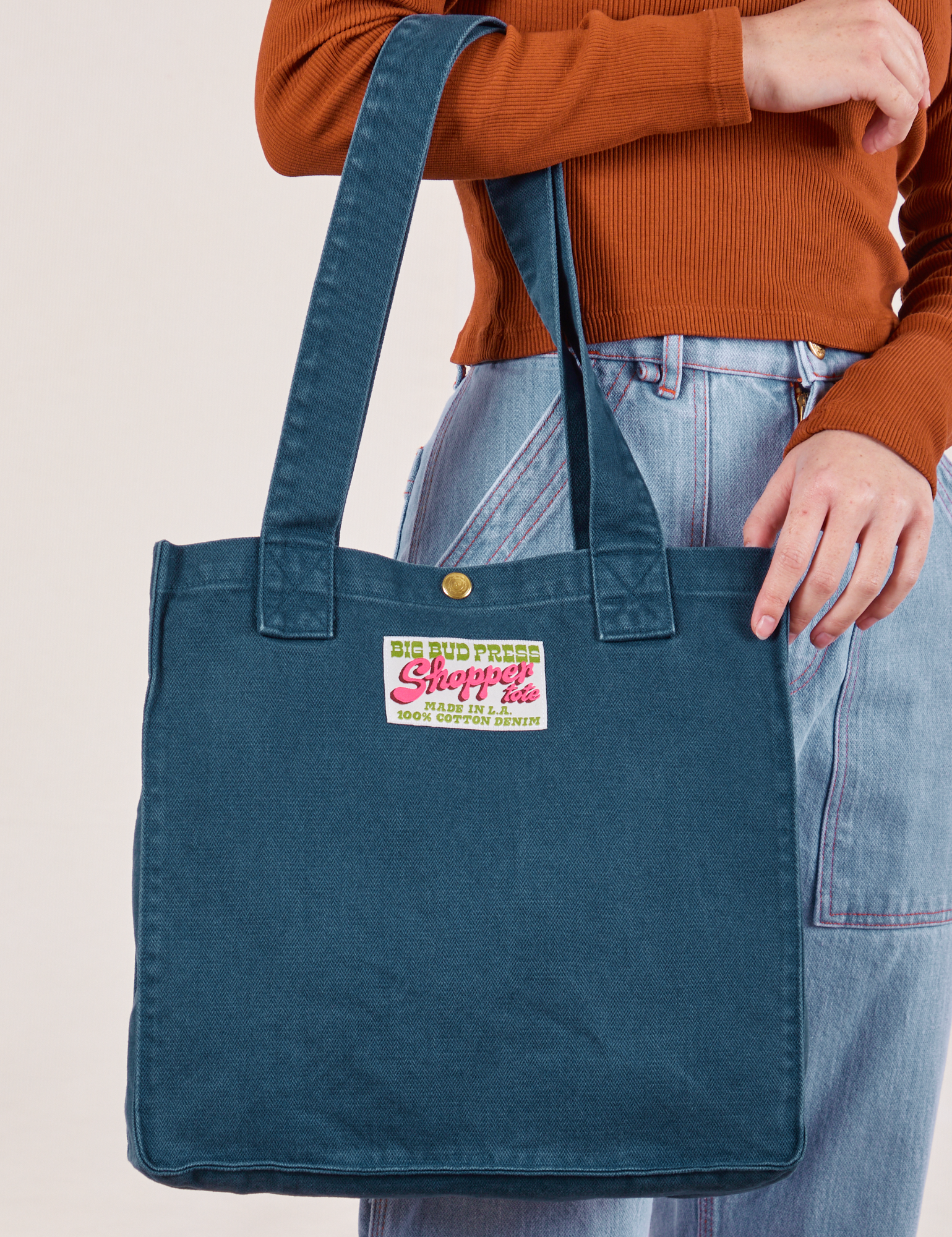 Shopper Tote Bag in Lagoon worn off arm of model