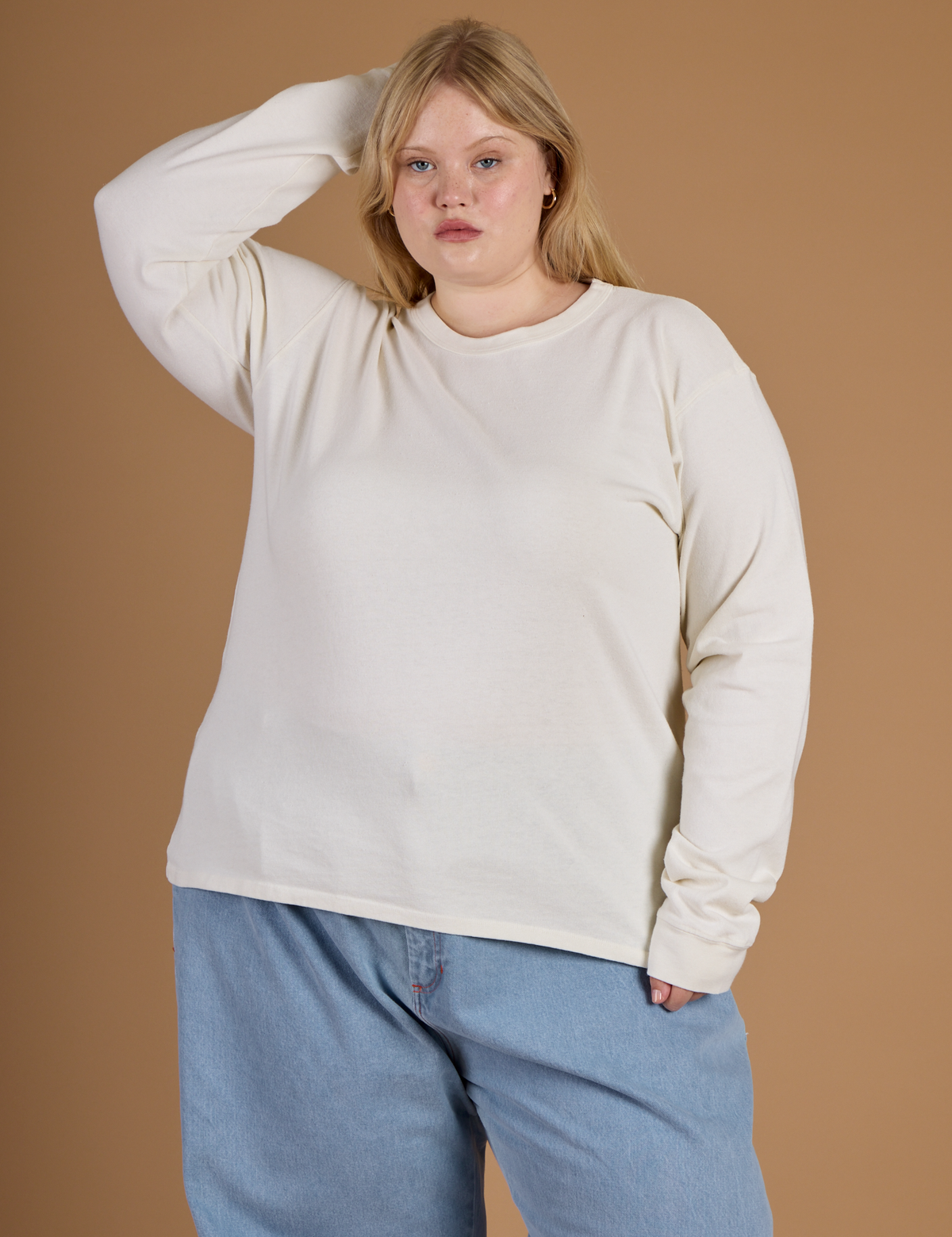 Juliet is 5'7" and wearing L Vintage Tee White Long Sleeve Burly Tee