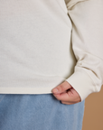 Close up of the hem on the Vintage Tee White Long Sleeve Burly Tee worn by Juliet