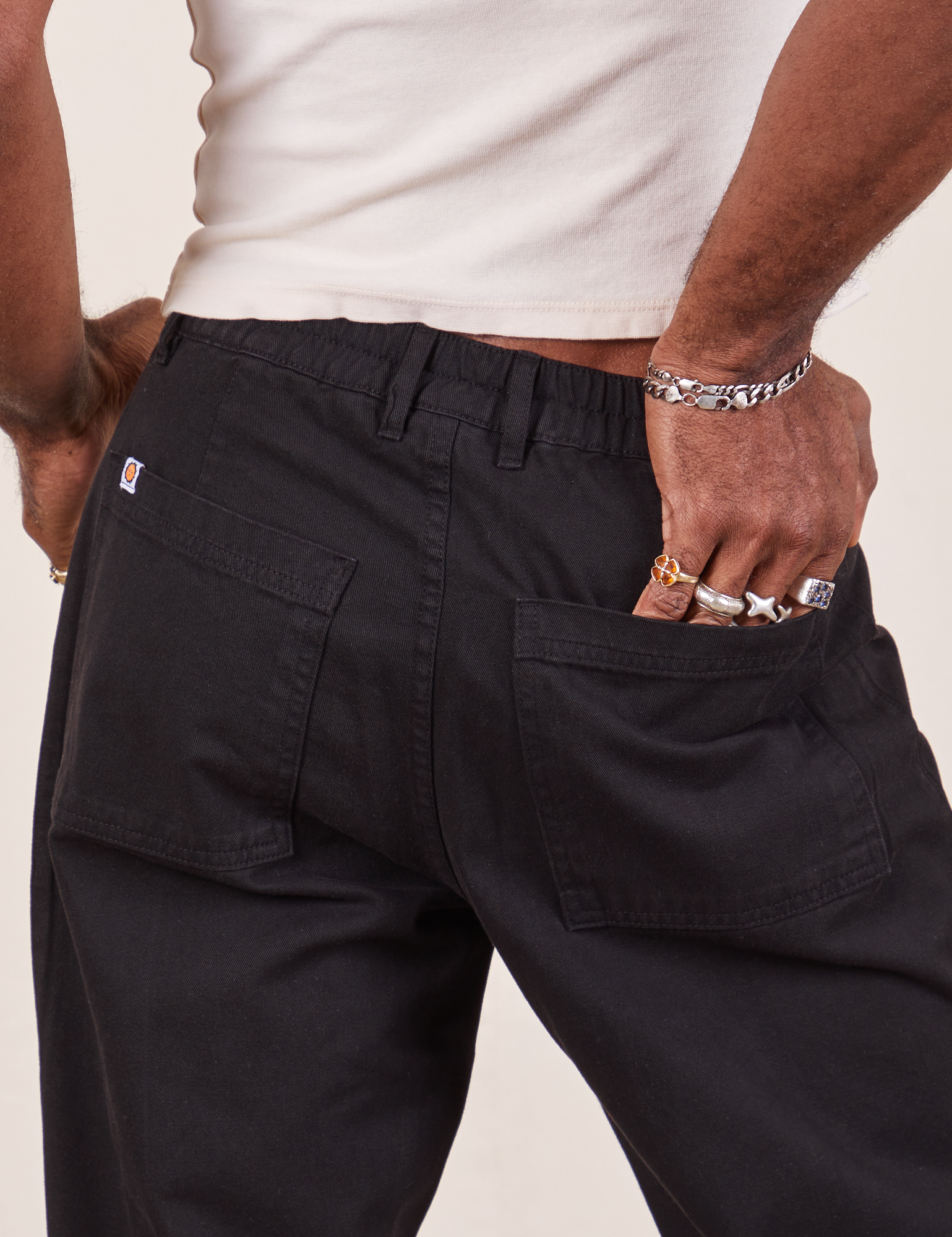 Western Pants in Basic Black back close up on Jerrod
