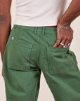 Western Pants in Dark Emerald Green back close up on Jerrod.