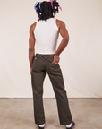 Back view of Western Pants in Espresso Brown and vintage off-white Tank Top on Jerrod