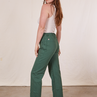 Work Pants in Dark Emerald Green side view on Allison wearing vintage off-white Tank Top