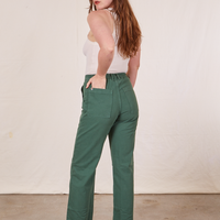 Work Pants in Dark Emerald Green back view on Allison wearing vintage off-white Tank Top