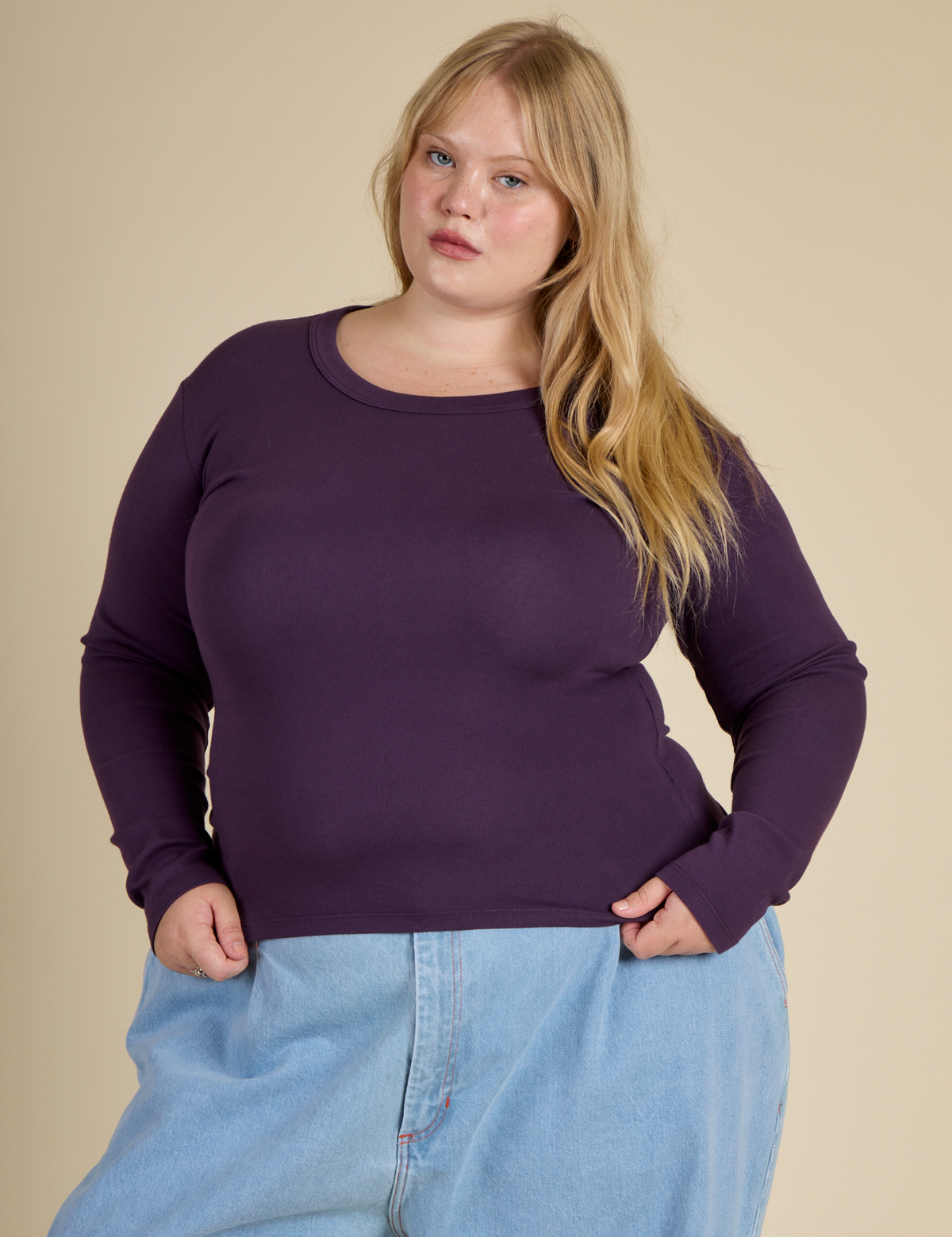 Juliet is 5'7" and wearing L Nebula Long Sleeve Baby Tee