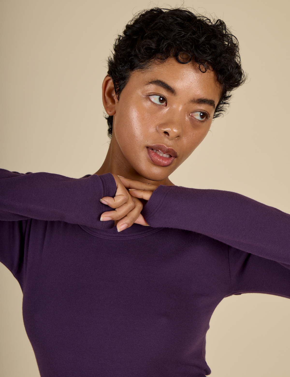 Close up of Mika in the Nebula Long Sleeve Baby Tee