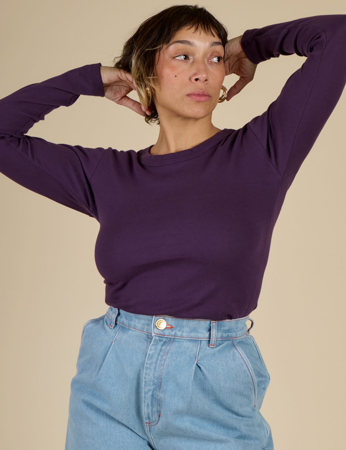 Tiara wearing the Nebula Long Sleeve Baby Tee