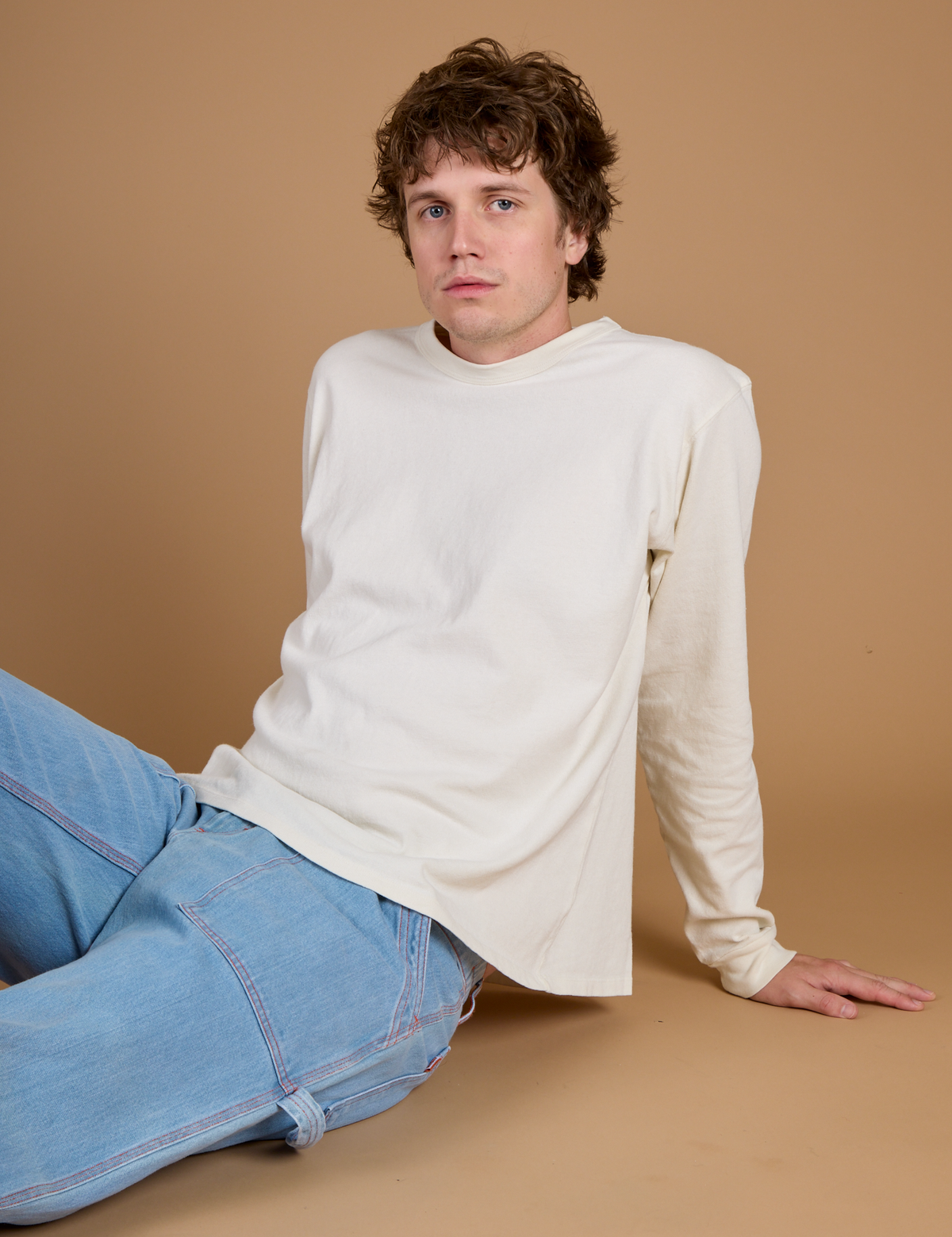 Quinn wearing the Vintage Tee White Long Sleeve Burly Tee