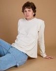 Quinn wearing the Vintage Tee White Long Sleeve Burly Tee