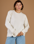 Tiara is 5'4 and wearing XS Vintage Tee White Long Sleeve Burly Tee