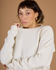 Close up of Tiara wearing the Vintage Tee White Long Sleeve Burly Tee