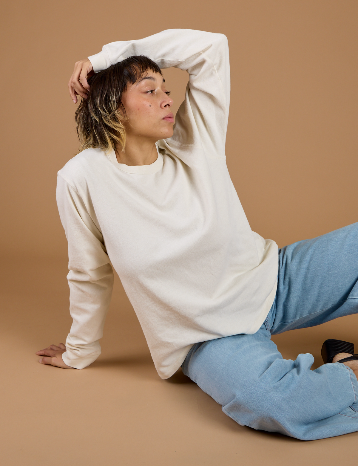 Tiara wearing the Vintage Tee White Long Sleeve Burly Tee
