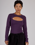 Mika wearing the Nebula Purple Long Sleeve Porthole Tee