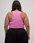 Back view of the P Bubblegum Pink Deep Cut Racerback on Kristen