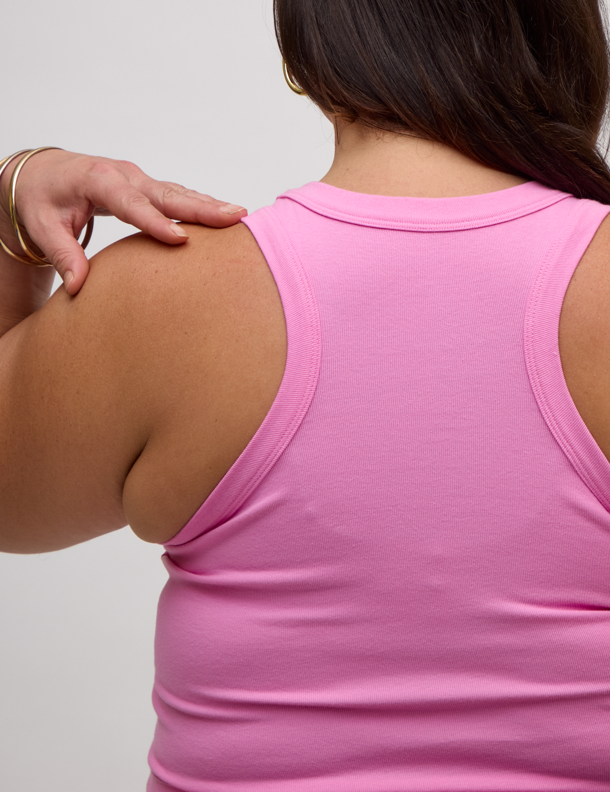 Close up Back view of the P Bubblegum Pink Deep Cut Racerback on Kristen