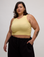 Kristen is 5'9" and wearing L Butter Yellow Deep Cut Racerback