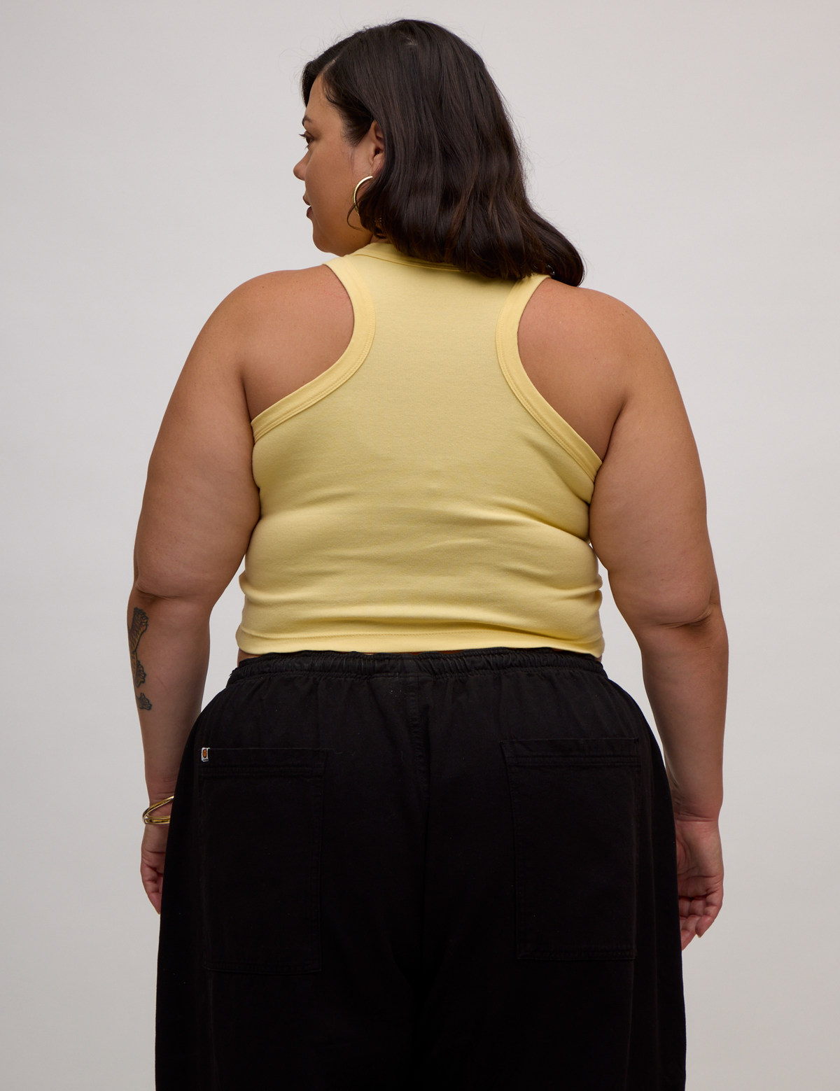 Back view of the Butter Yellow Deep Cut Racerback on Kristen
