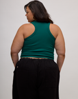 Back view of the Hunter Green Deep Cut Racerback on Kristen