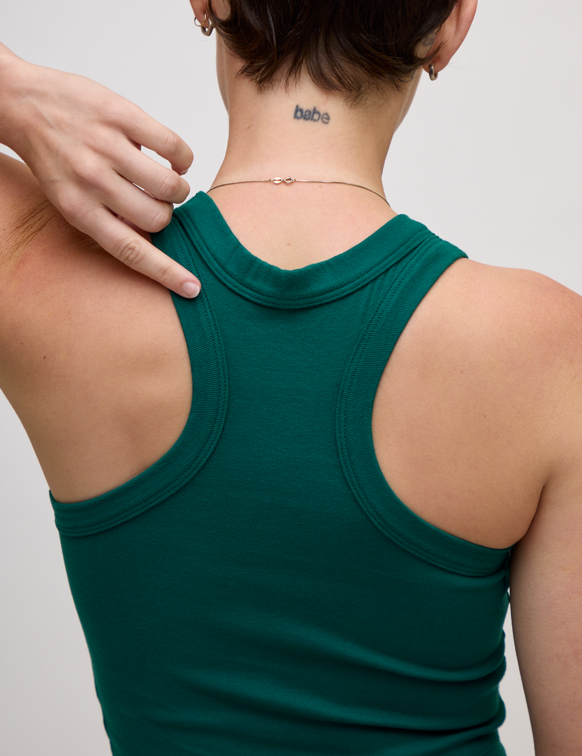 Close up back view of the Hunter Green Deep Cut Racerback