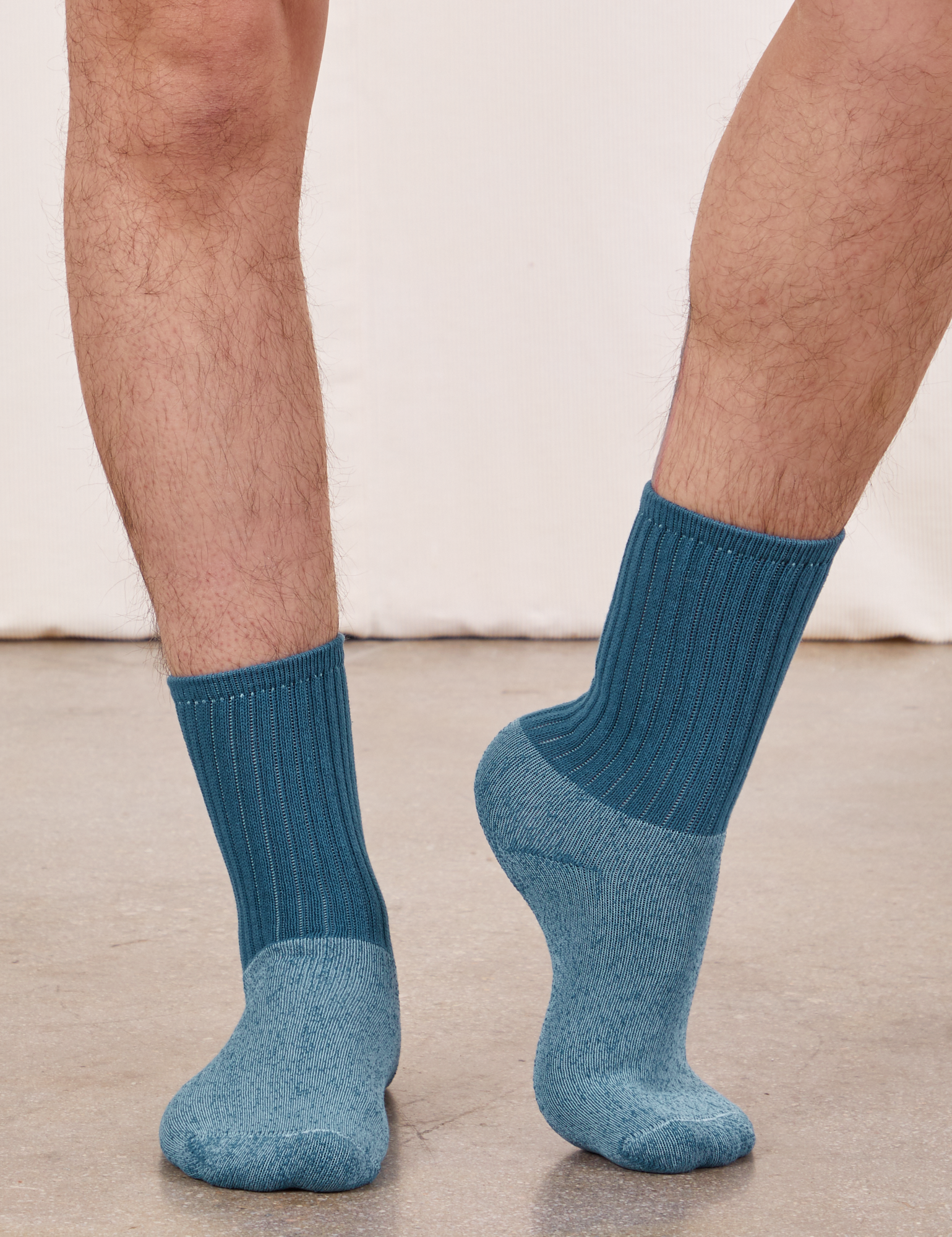 Thick Crew Socks in Marine Blue on model