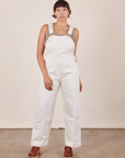 Tiara is 5'4" and wearing size XS Original Overalls in Vintage Off-White paired with khaki grey Tank Top