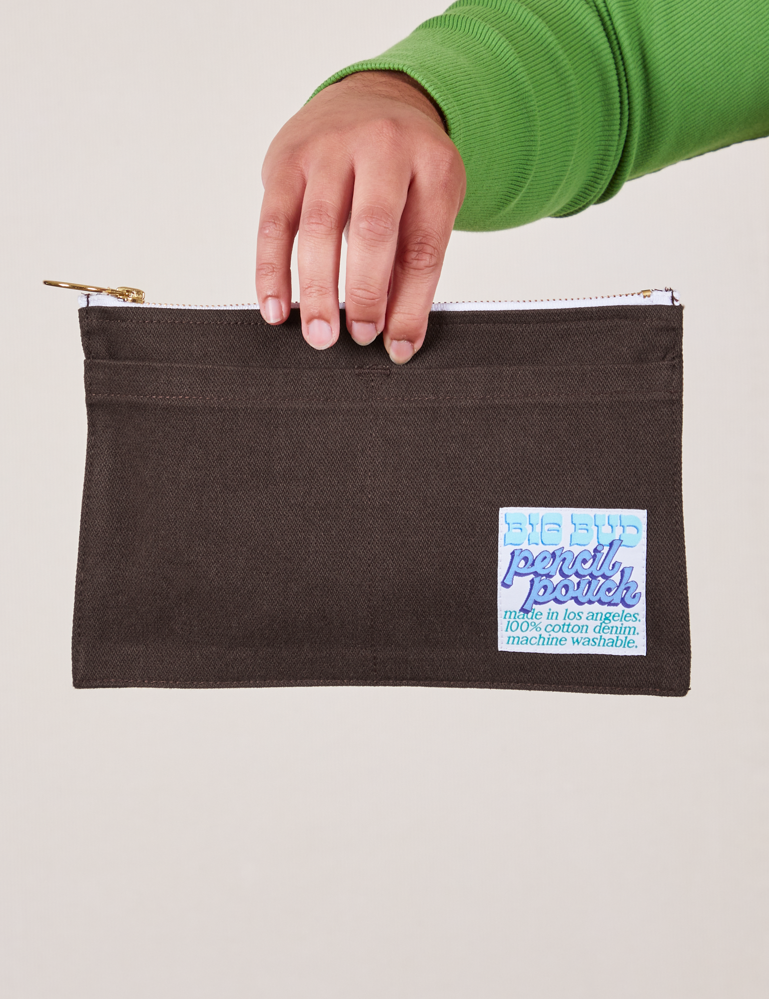 Pencil Pouch in Espresso Brown held by model