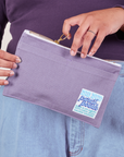 Pencil Pouch in Faded Grape held by model