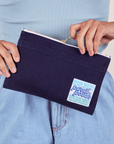 Pencil Pouch in Navy Blue held by model