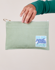 Pencil Pouch in Sage Green held by model