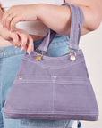 Overall Handbag in Faded Grape on arm of model