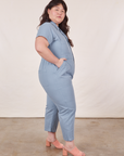 Side view of Petite Short Sleeve Jumpsuit in Periwinkle on Ashley