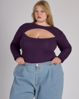 Juliet wearing the Nebula Purple Long Sleeve Porthole Tee tucked in