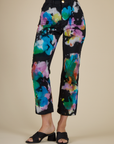 Close up of the Rainbow Magic Waters Work Pants worn by Alex